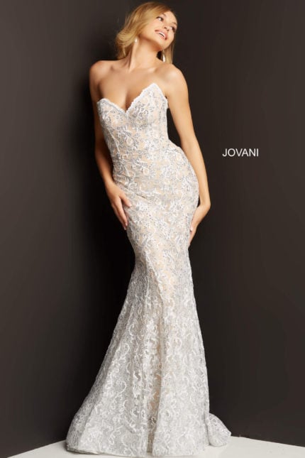 Model wearing Jovani 08215 elegant white mermaid gown with sweetheart neckline and lace detailing.