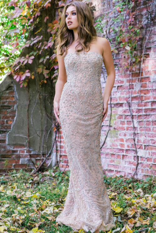 Model wearing Nude and Silver Strapless Beaded Dress 99700