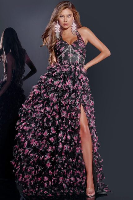 Model wearing D5065 black floral applique gown with high slit and sweetheart neckline from Jovani, front view.