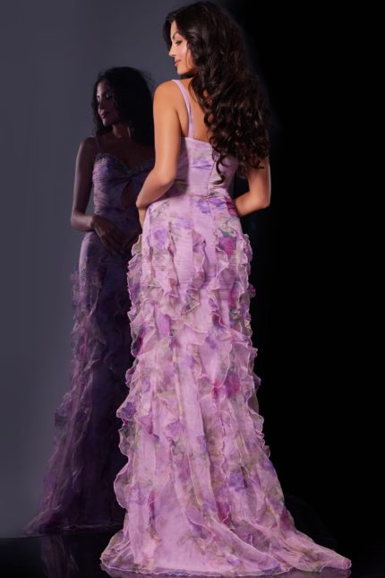 Model wearing Jovani D5113 multi-colored gown, back view showing layered ruffles and fitted silhouette.