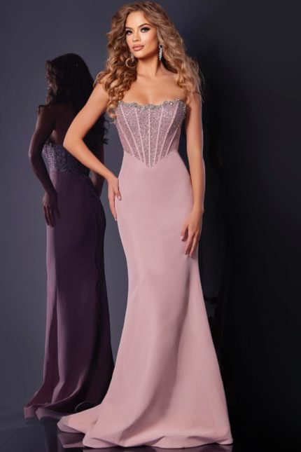 Model wearing D5310 blush mermaid gown, side view with embellishments visible.