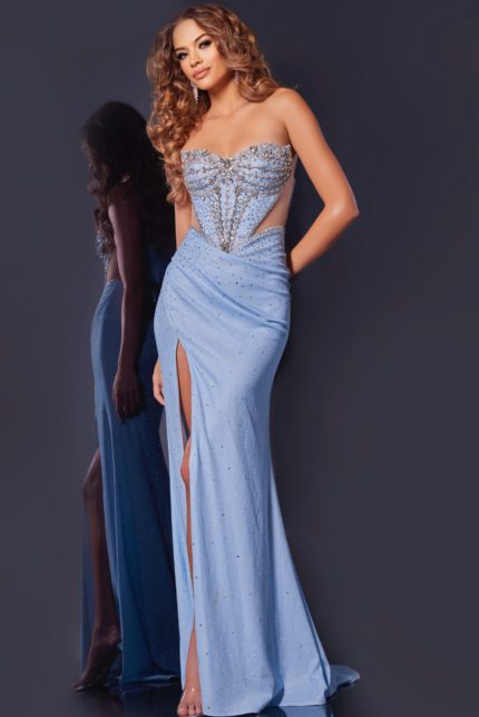 Model wearing Jovani D5414 blue dress showing exquisite embellishments and high slit.