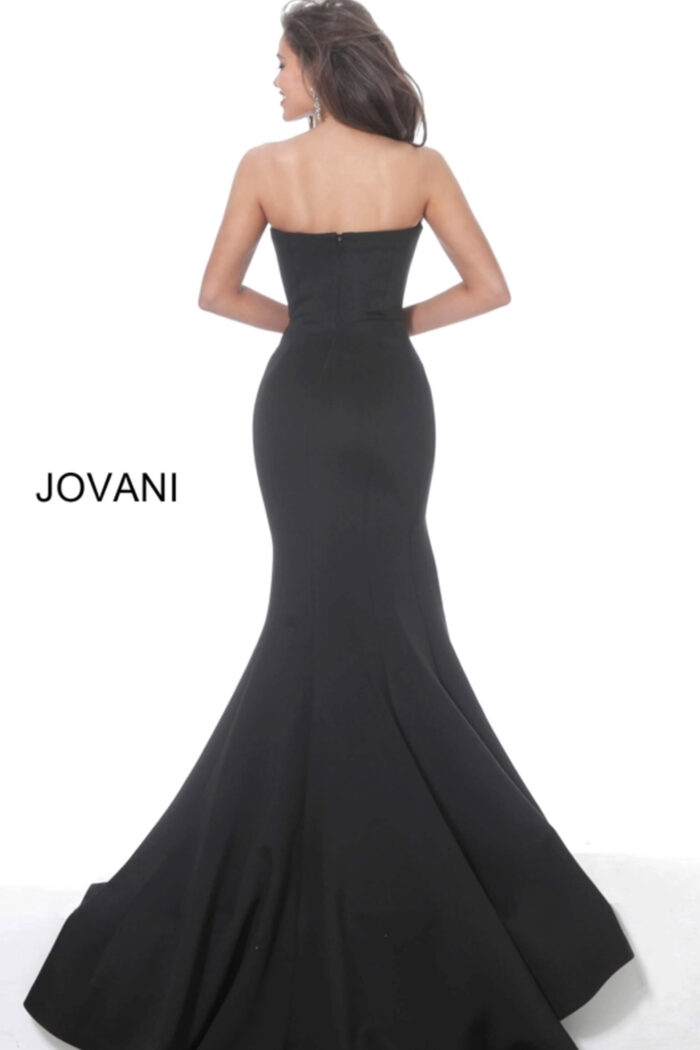 Model wearing Jovani 94366 Black Strapless Straight Neck Scuba Evening Gown