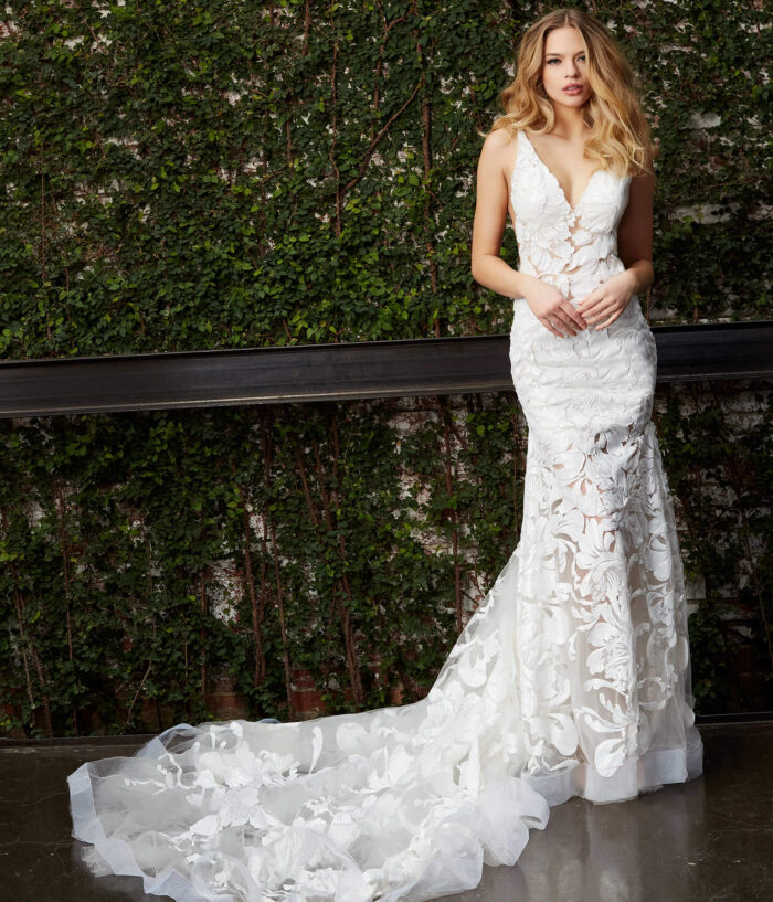 Model wearing Jovani JB04192 White Embellished V Neck Wedding Dress