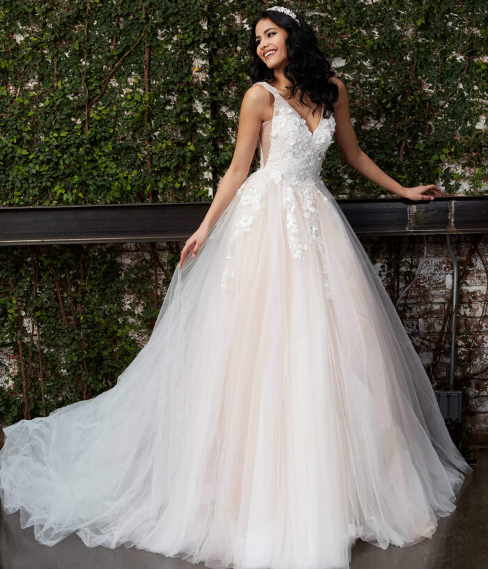 Model wearing Jovani JB05353 Off White Blush Floral Appliques Bridal Ballgown