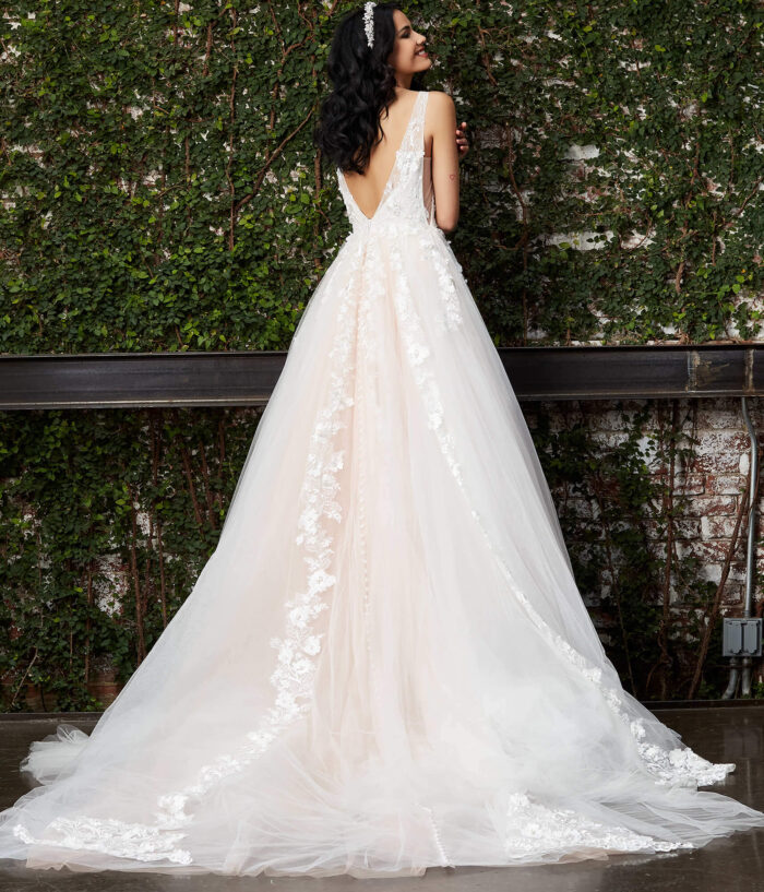 Model wearing Jovani JB05353 Off White Blush Floral Appliques Bridal Ballgown