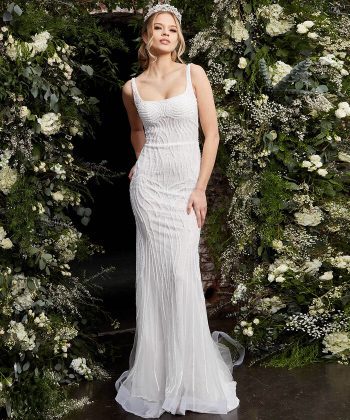 Model wearing Jovani JB06666 Off White Embellished Sheath Bridal Dress