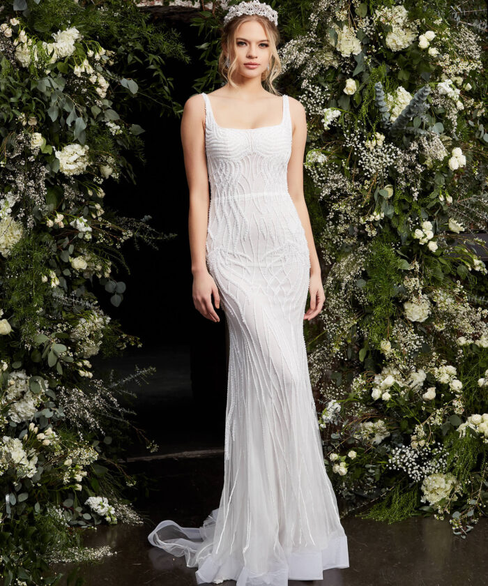 Model wearing Jovani JB06666 Off White Embellished Sheath Bridal Dress
