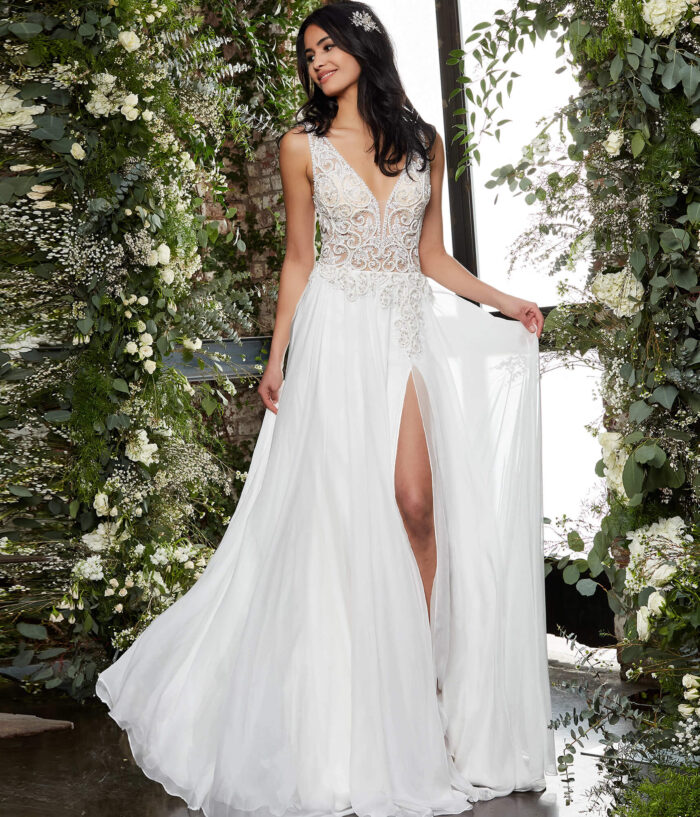Model wearing Jovani JB06795 Off White Chiffon High Slit Wedding Dress