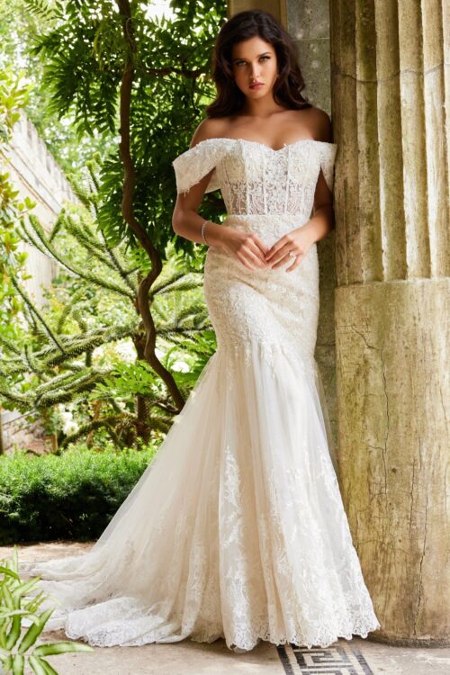 Model wearing Jovani JB07161 Ivory Off the Shoulder Lace Bridal Dress