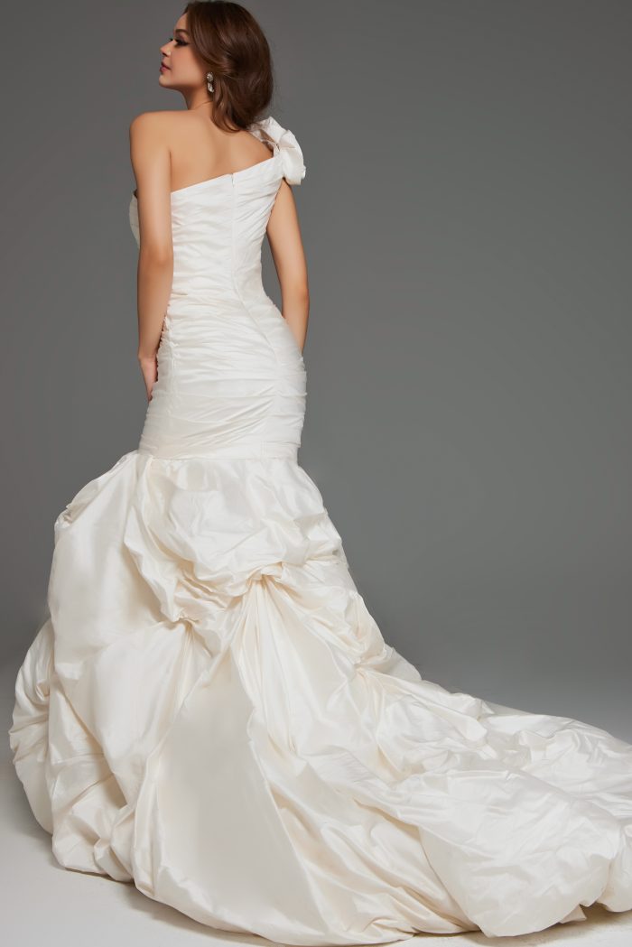 Back view of mermaid wedding gown with dramatic train.