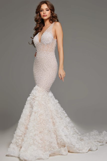 Model wearing Jovani JB07233 white mermaid silhouette dress with intricate beadwork and floral applique skirt, front view.