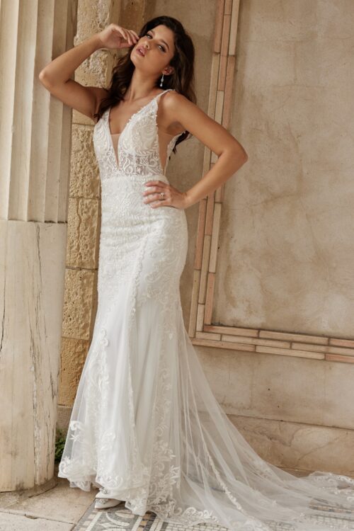 Model wearing Jovani JB07385 Ivory Lace Sleeveless Bridal Dress