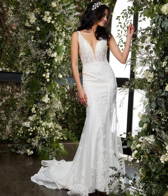Model wearing Jovani JB07385 Ivory Lace Sleeveless Bridal Dress