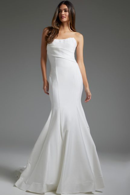 Model wearing Jovani JB24282 elegant white floor-length mermaid dress with strapless neckline.