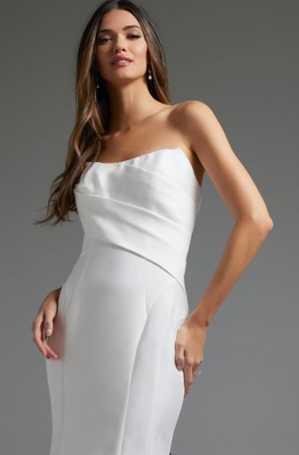 Close-up of the model in Jovani JB24282 white dress highlighting the strapless neckline and fitted bodice.