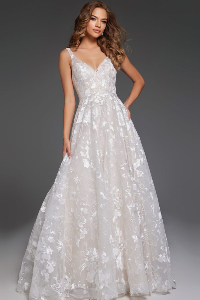 V-neck lace wedding dress in soft ivory tones.