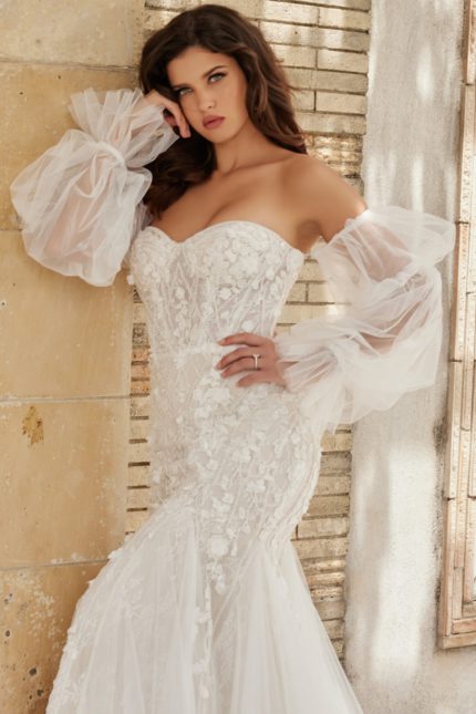 Model posing in Jovani JB38491 white dress with sweetheart neckline, close-up.