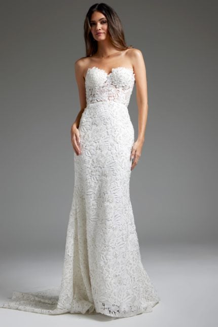 Model wearing Jovani JB39733 elegant white gown with lace detail, front view.