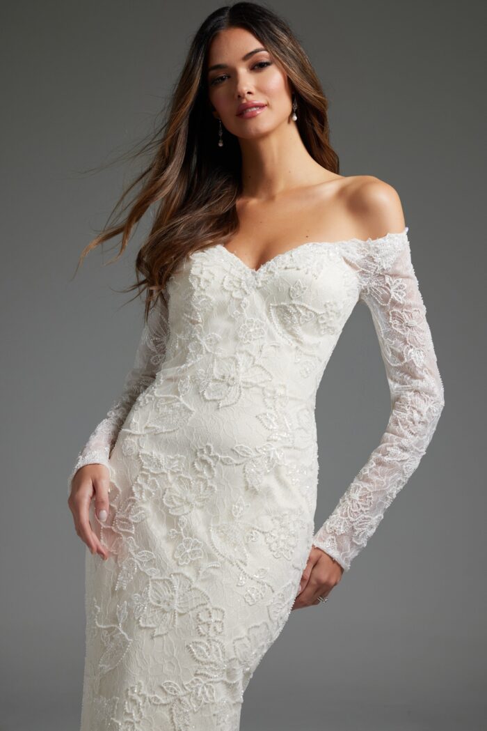 Model wearing Off the Shoulder Embellished Long Sleeve Wedding Gown JB40591