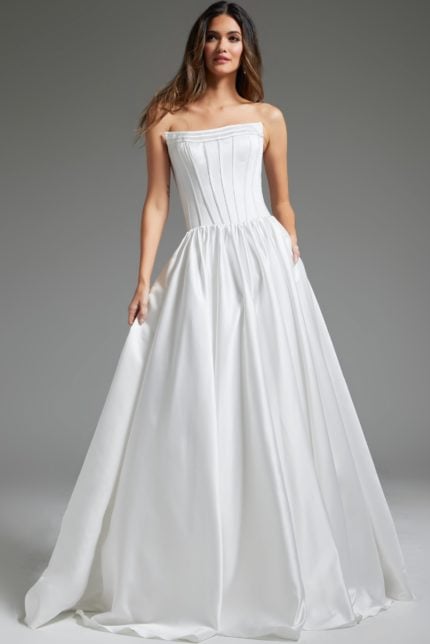 Model wearing Jovani JB40784 white strapless A-line gown, front view.