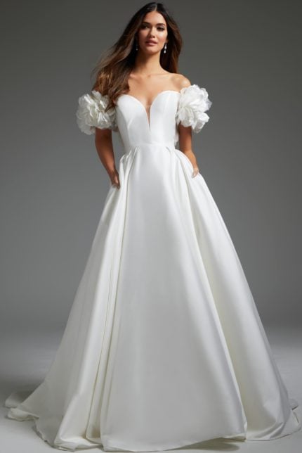 Model wearing Jovani JB40795 off-white gown with floral sleeves, front view.