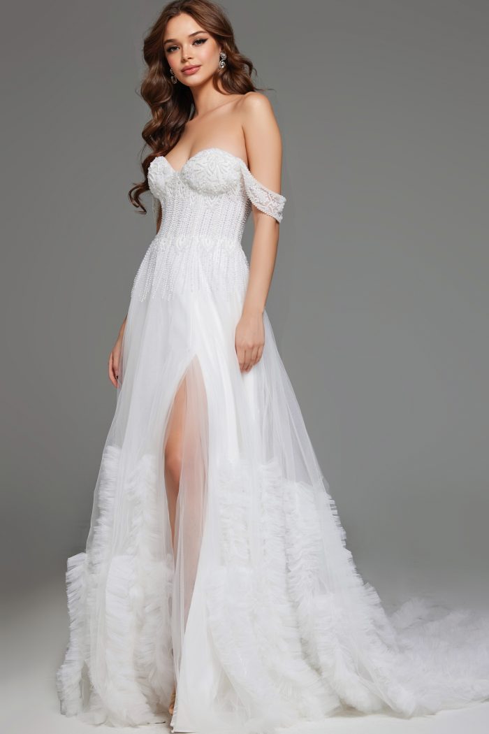 Off-shoulder bridal gown with detailed beading and high slit