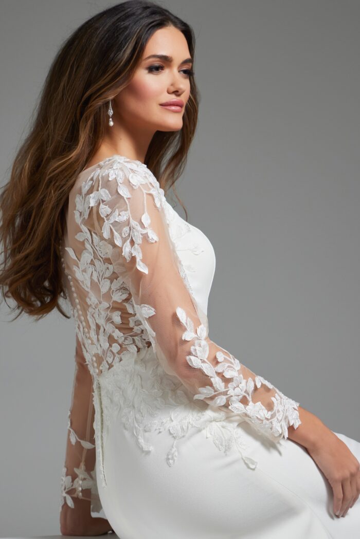 Model wearing Ivory Long Sleeve Sheath Bridal Dress JB42297