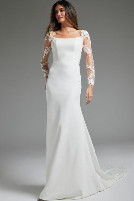 Model wearing Jovani JB42297 ivory gown with lace sleeves and square neckline, front view.