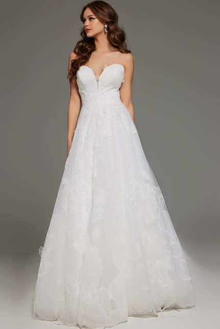 Full view of model in Jovani JB42324 ivory dress showcasing elegant silhouette and floral applique details.