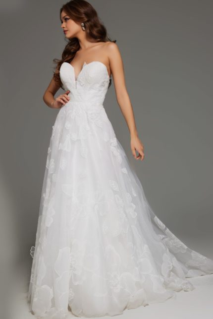 Front view of model wearing Jovani JB42324 ivory gown with floral appliques and sweetheart neckline.