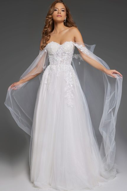 Model wearing Jovani JB42481, an elegant white gown with sweetheart neckline and lace applique.