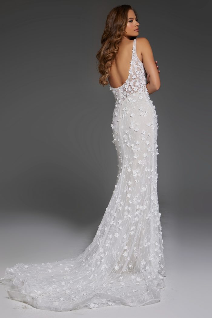 Back view of bridal gown with delicate lace floral appliqués and low scoop back JB42483