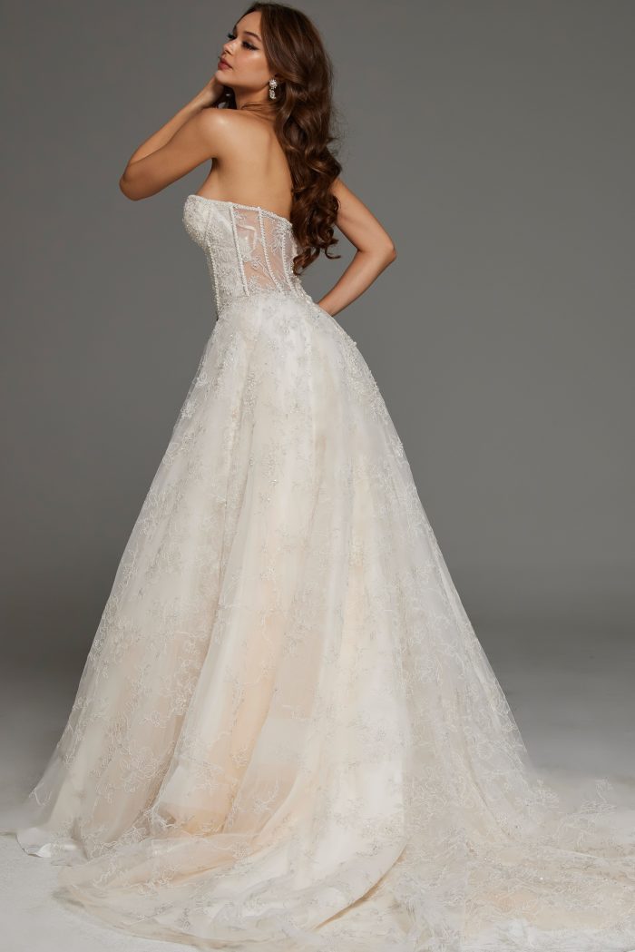 Elegant wedding dress with lace bodice and flowing train JB42766