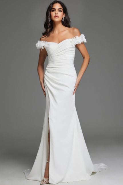 Model wearing Jovani JB43323, ivory off-the-shoulder dress with floral appliqués and front slit, showcasing the elegant front view.