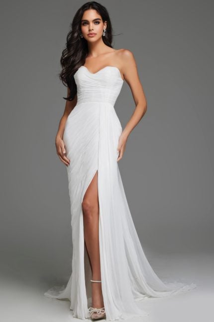 model wearing Jovani JB43897 elegant ivory gown with sweetheart neckline and high slit