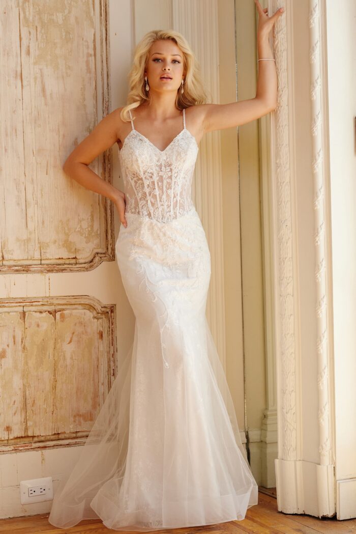Model wearing Jovani Bridal JB63673 White Sheer Corset Bodice Wedding Dress