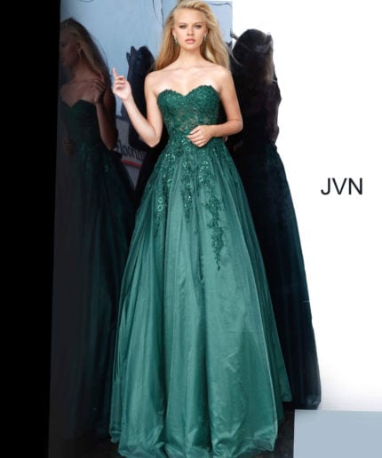 Model wearing Jovani 00915 green gown with elegant embroidery and flowing skirt.