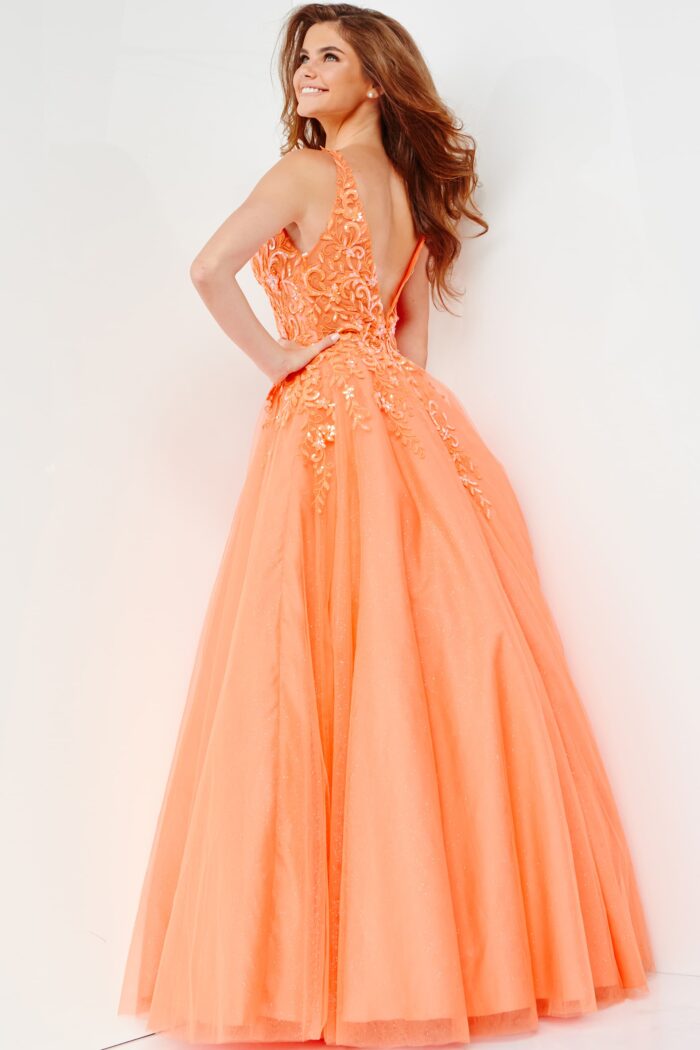 Model wearing JVN22831 Orange Embellished A Line Prom Ballgown