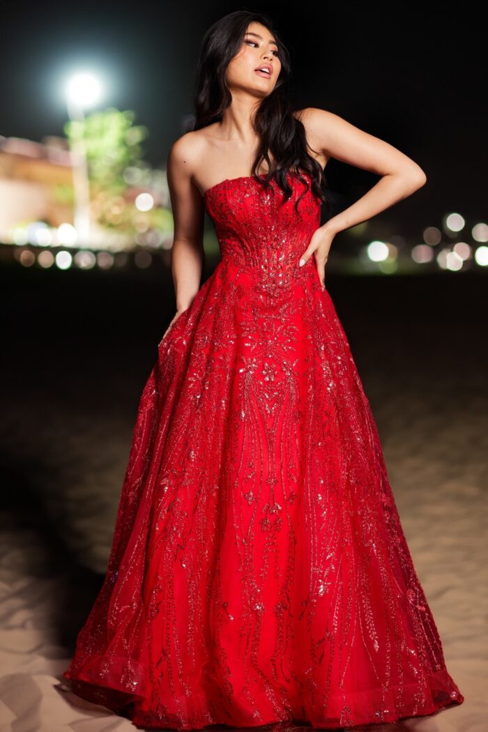 Model wearing Red Strapless Beaded Ball Gown 26109