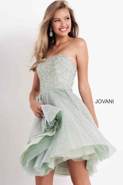 Model wearing K04445 mint dress with strapless beaded bodice and high-low hem.