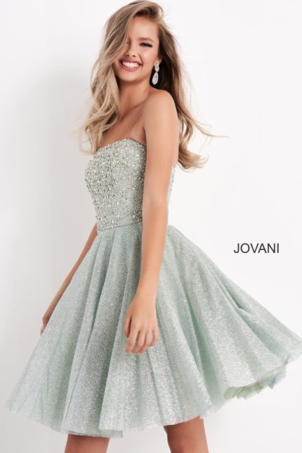 Model showcasing the front view of K04445 mint dress with shimmering high-low skirt.