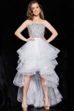 Front angle of Jovani K05916, a white high-low dress with sequins and tulle layers.