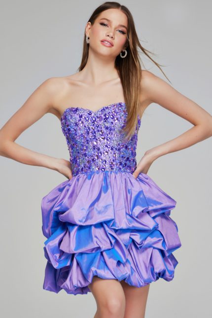 Model wearing Jovani K07390 lilac short dress with beaded sweetheart neckline and ruffled skirt, front view.