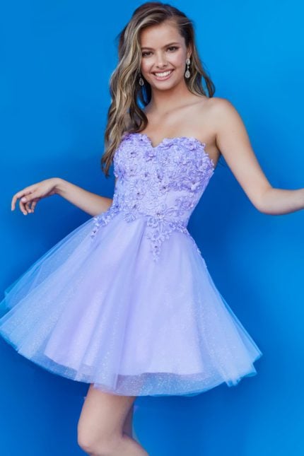 Model wearing Jovani K07817 dress in lilac with floral lace bodice and tulle skirt, front view.