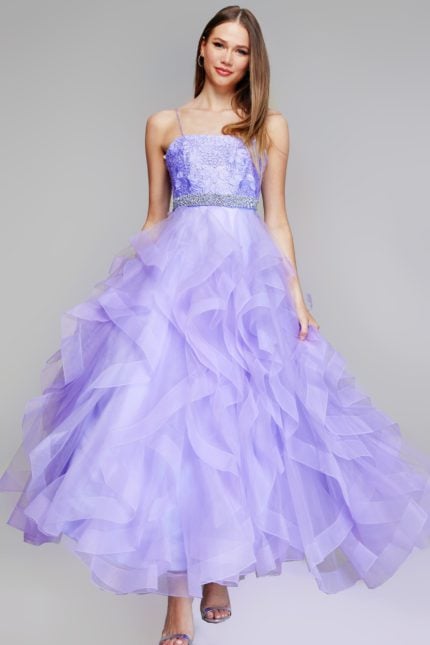 Model wearing Jovani K23519 lilac A-line gown with ruffled tulle skirt and lace detailed bodice.