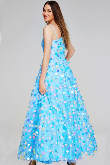 Back view of model wearing K23877 multi-colored dress showing elegant flow of the fabric.