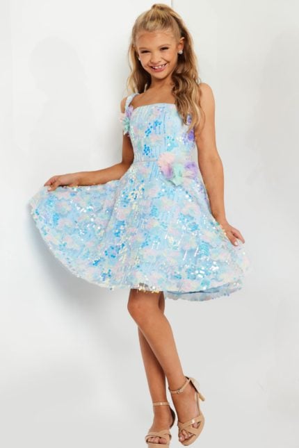 Model wearing Jovani K23956 multi-hued dress with floral accents.