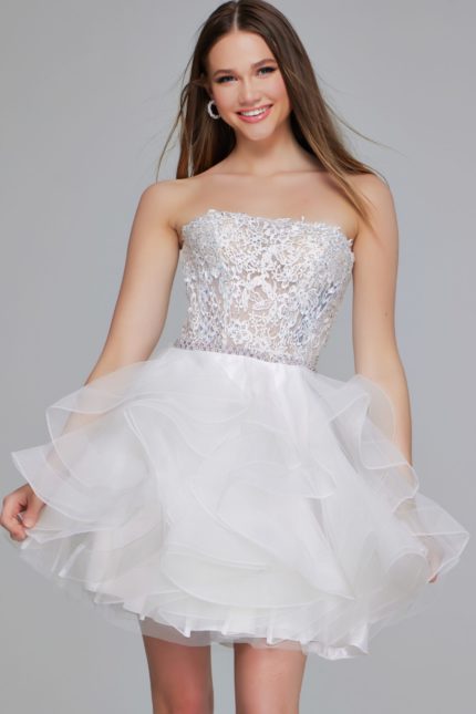 Model wearing Jovani 24371 white dress with strapless lace bodice and tulle skirt, front view.