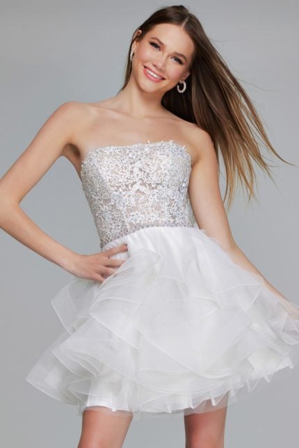 Model wearing Jovani 24371 white dress with strapless lace bodice and tulle skirt, front view.